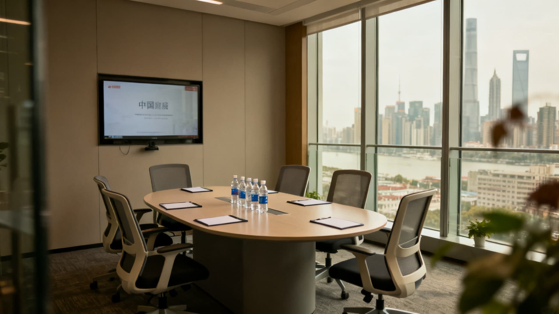 photo: a meeting room in an office block, a table for six